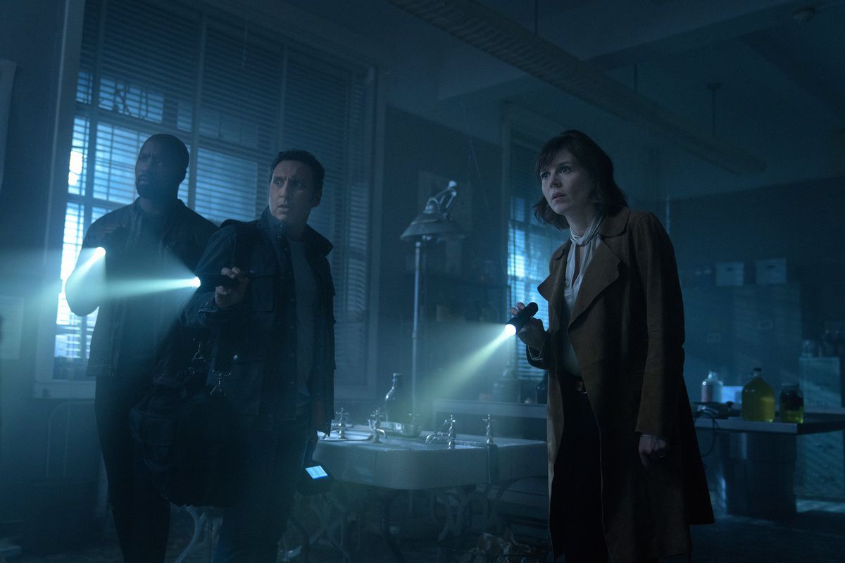 (L-R) Mike Colter as David Acosta, Aasif Mandvi as Ben Shakir and Katja Herbers as Kristen Bouchard of the Paramount+ series Evil.